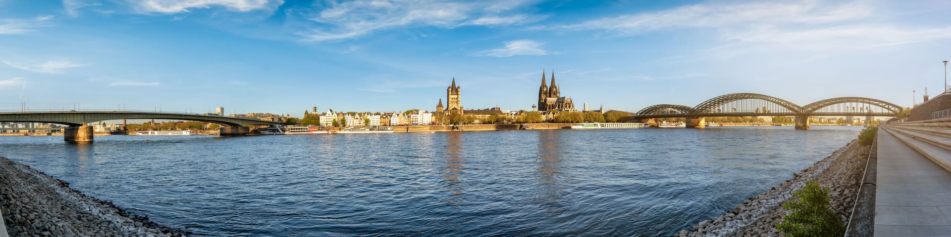 A river with bridges, a cathedral, and a tower.