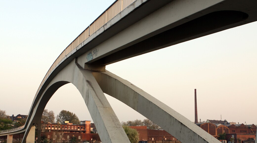 Pedestrian bridge over the entrance to the Rhine port Muelheim, Germany; Shutterstock ID 689931151