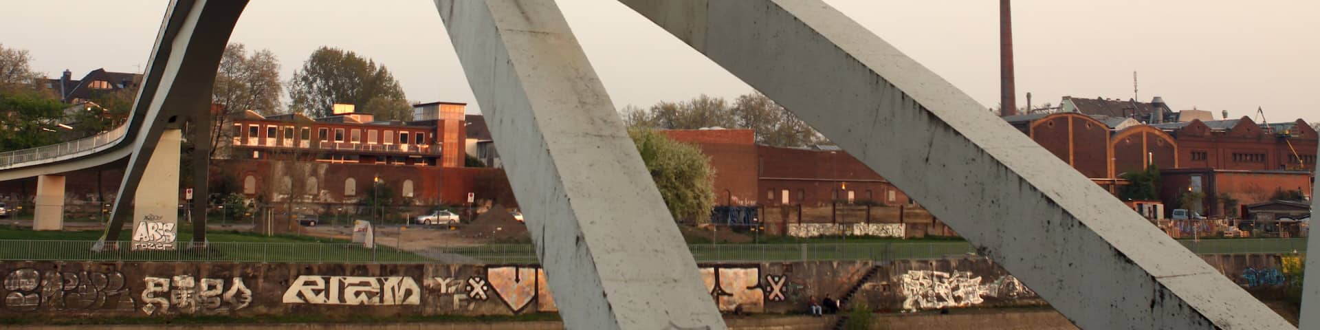 Pedestrian bridge over the entrance to the Rhine port Muelheim, Germany; Shutterstock ID 689931151