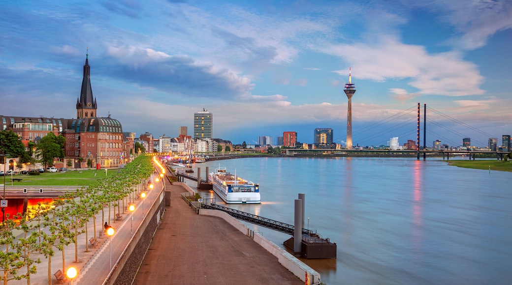 Dusseldorf, Germany. Panoramic cityscape image of riverside Düsseldorf, Germany with Rhine river during sunset.
