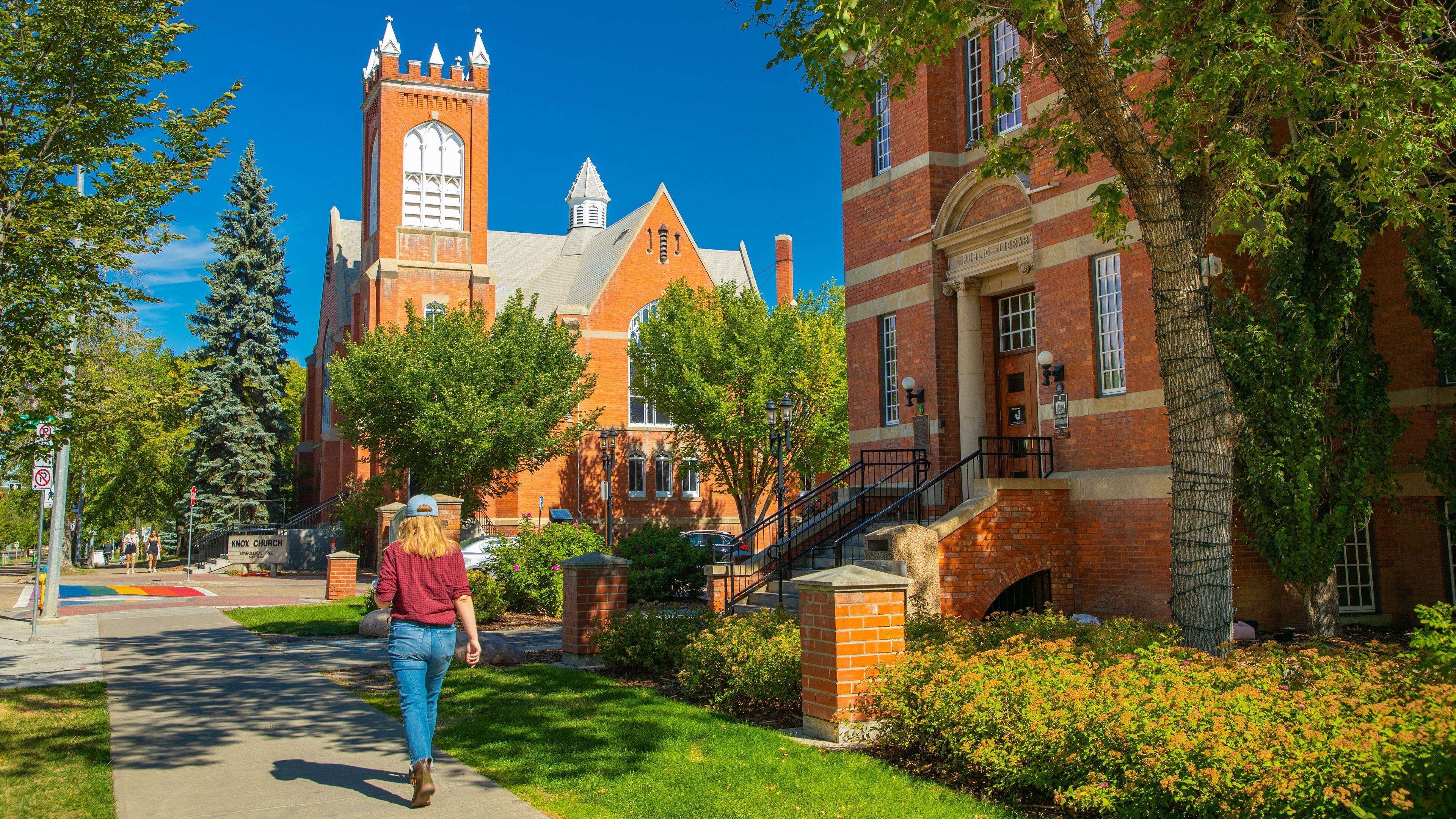 Whyte ave featuring heritage elements as well as an individual femail