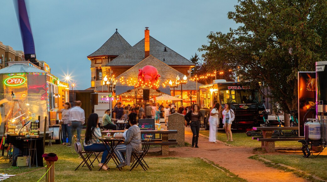 Whyte ave featuring markets, outdoor eating and night scenes