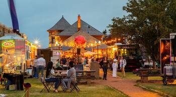 Whyte ave featuring markets, outdoor eating and night scenes
