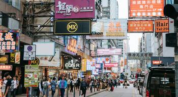 Mong Kok showing signage, street scenes and a city