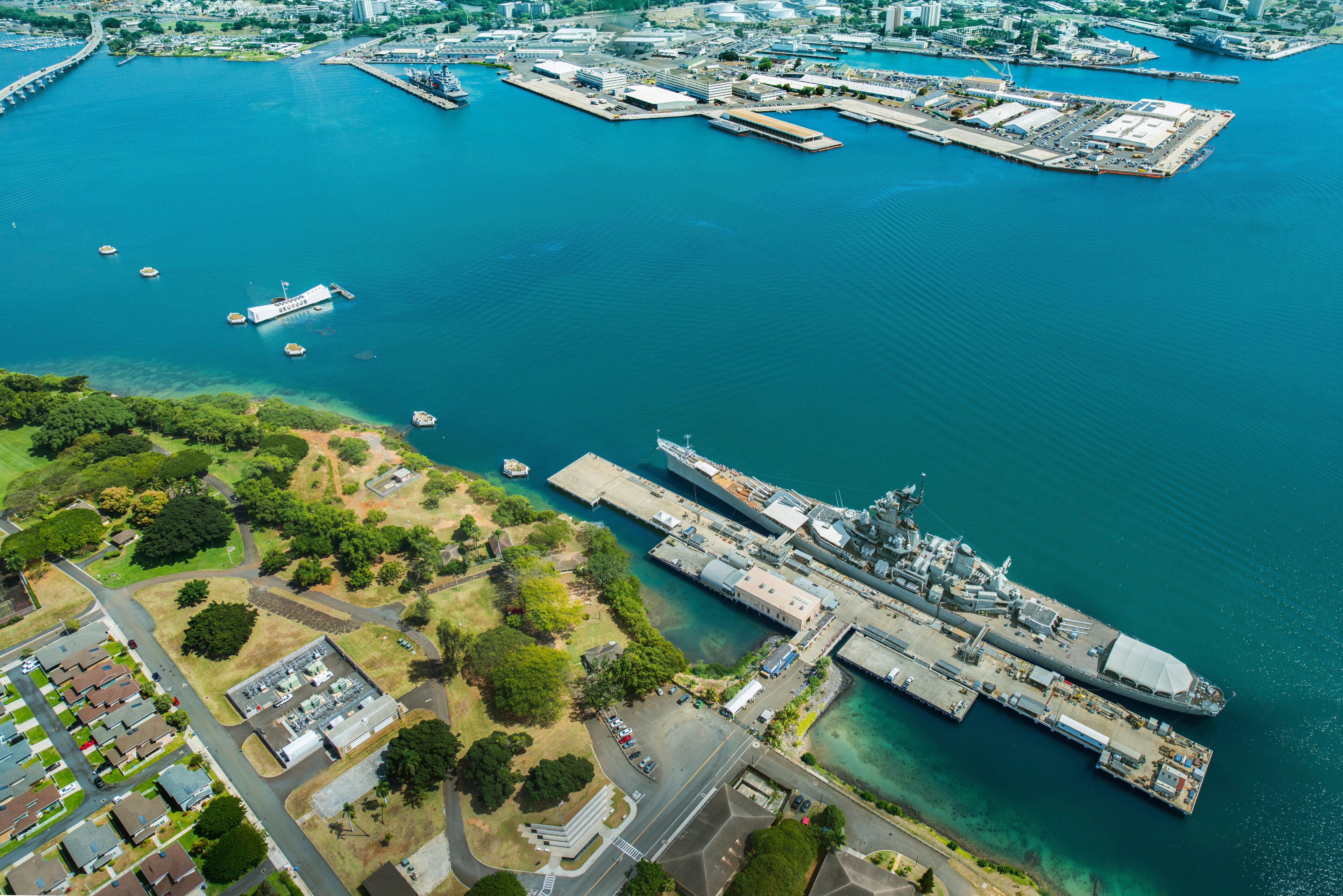 Aerial view of Arizona Memorial and Mighty Mo Missouri battleship at Pearl Harbor, Honolulu, Hawaii, USA