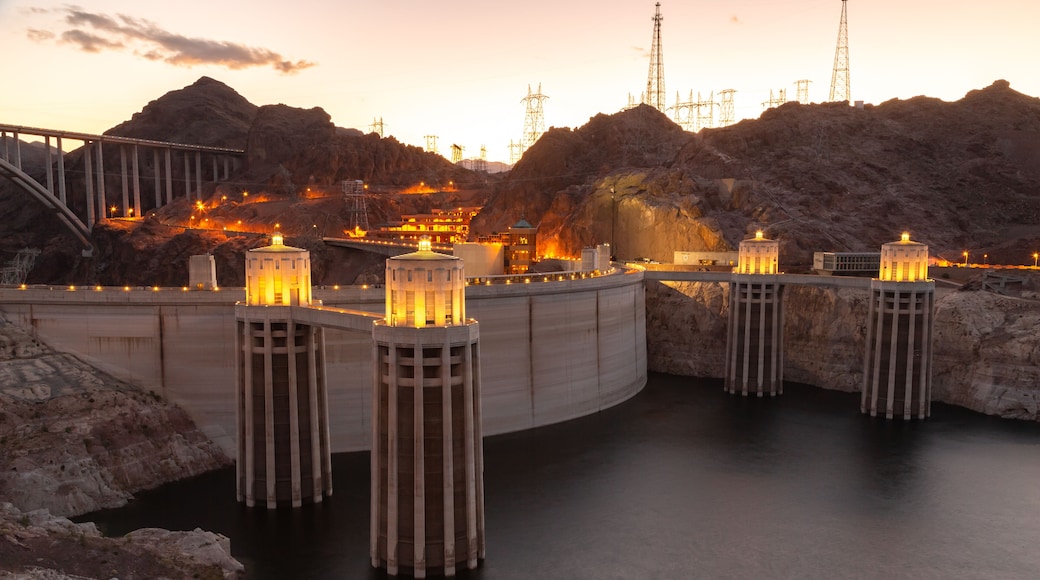 Hoover dam close-up shot. Hoover dam and Lake Mead in Las Vegas area. Large Comstock Intake Towers At Hoover Dam. Hoover Dam in the evening with illuminations without people.