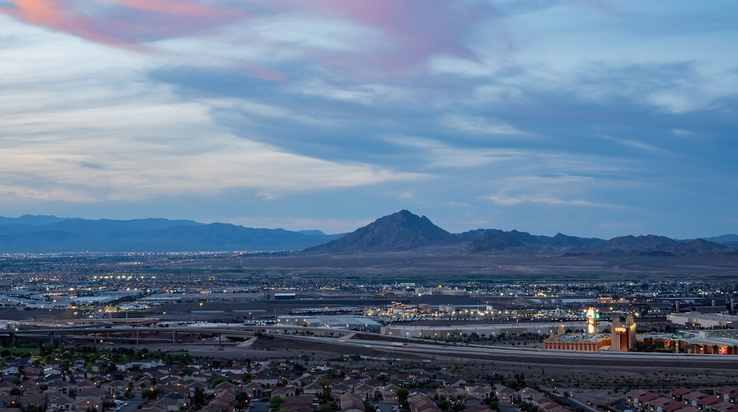 Sunset high angle view of the Frenchman Mountain and cityscape from Henderson View Pass