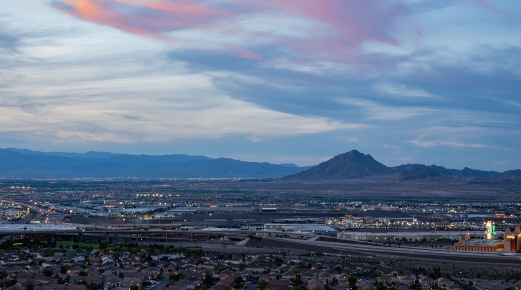Sunset high angle view of the Frenchman Mountain and cityscape from Henderson View Pass