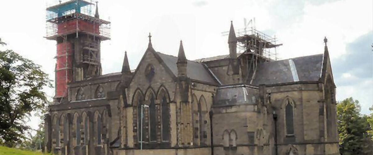 West tower of St Paul's parish church, Stalybridge, Greater Manchester, seen from the northwest during restoration work