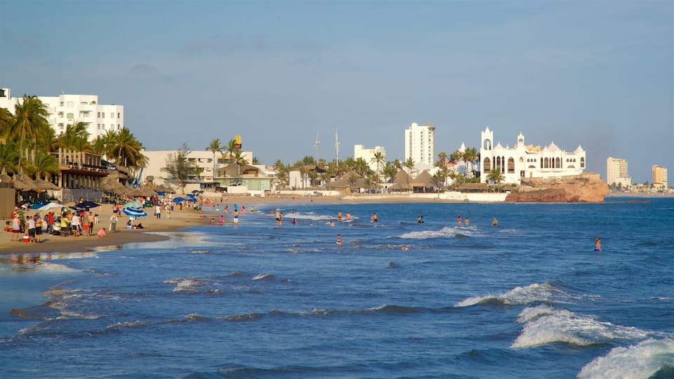 Zona Dorada featuring surf, general coastal views and a sandy beach