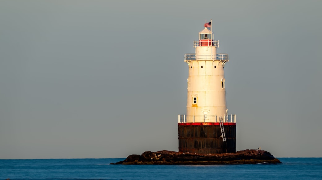 07/10/2022 - Little Compton, RI USA - Early morning image of the Sakonnet Point Light (West Island Light) between Little Compton and Tiverton Rhode Island, at Sakonnet River and Atlantic Ocean.