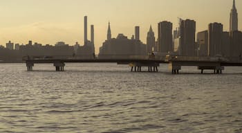 Pier extending out onto the East River, sunset scene from Transmitter Park in Greenpoint, Brooklyn