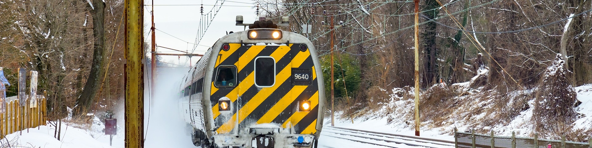 Amtrak Keystone train approaching Narberth statioon in the cold