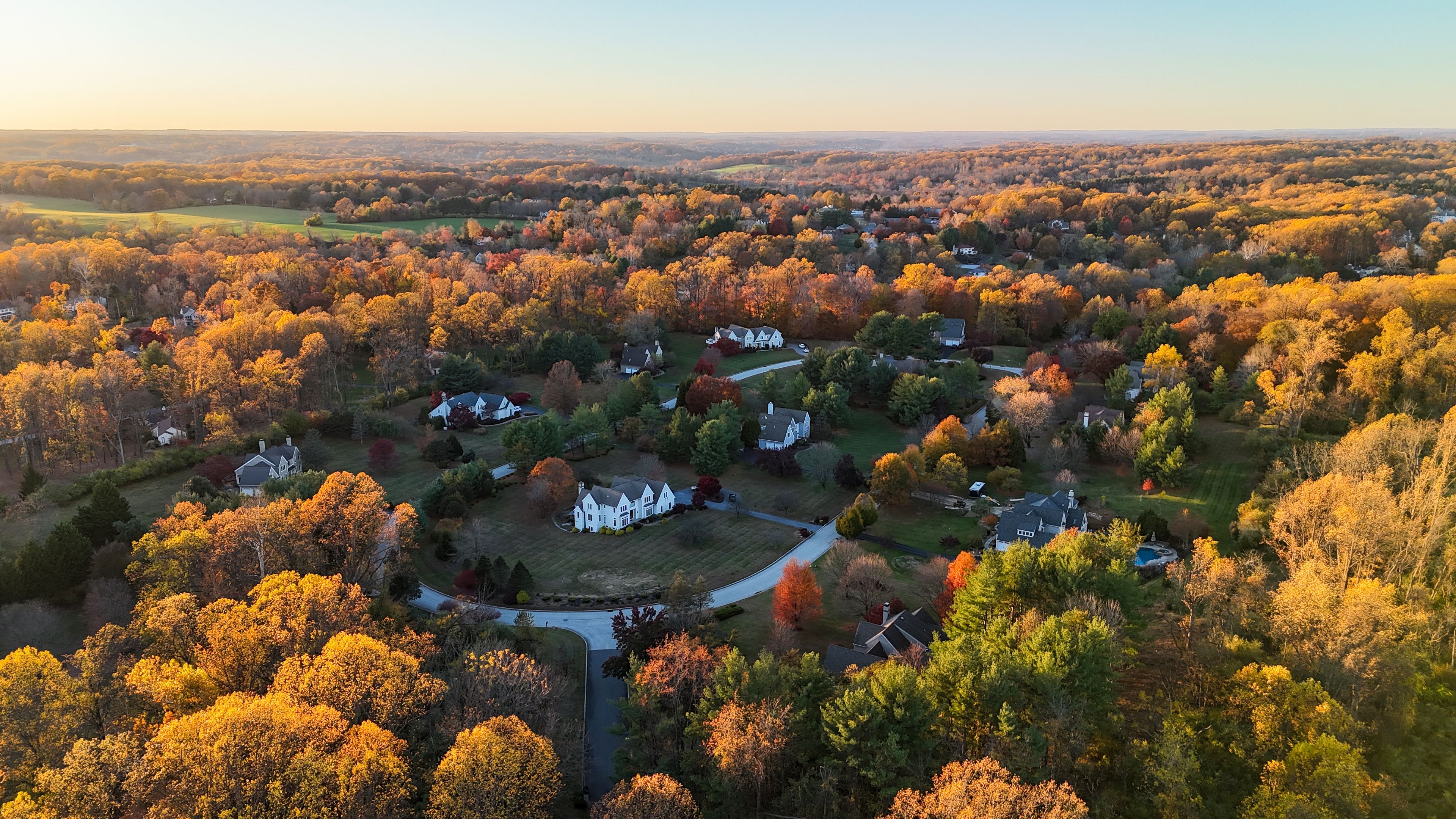 Aerial view of colorful autumn neighborhood in Chadds Ford, Pennsylvania suburb near Philadelphia
