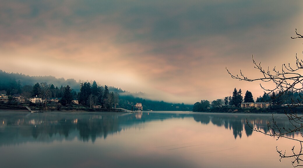 Riverwood and Milwaukie on opposite sides of the Willamette River, Cloudy sky, still water, long exposure, seen from Milwaukie Bay Park at dawn