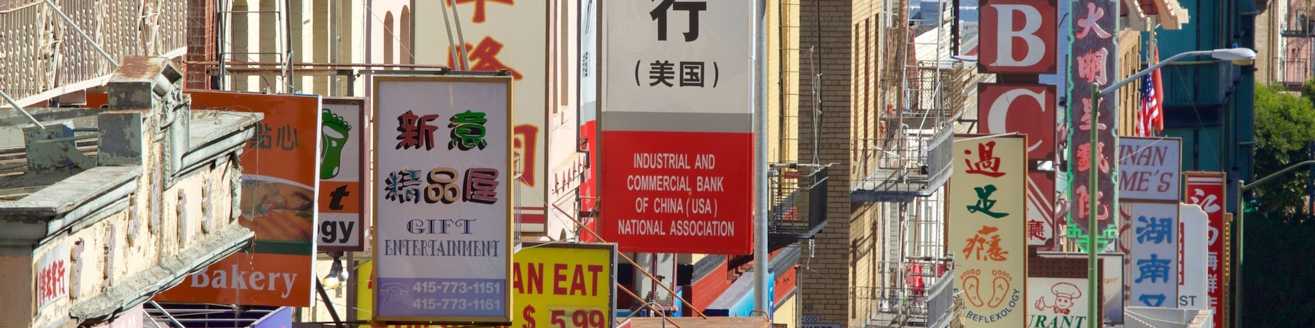 Chinatown showing signage, central business district and a city
