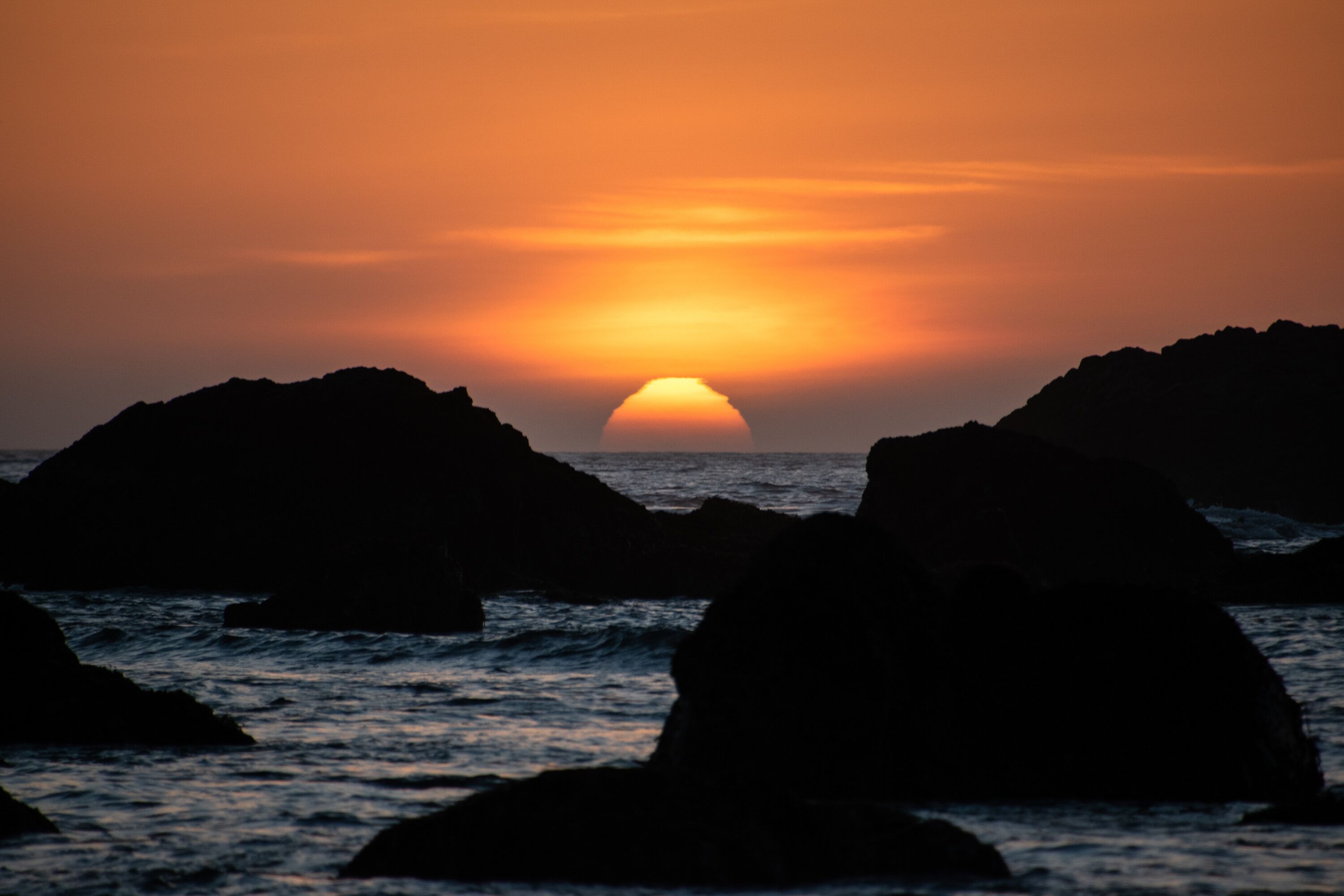 Sun Going Down Over Horizon Along Trinidad, CA Coast in Humboldt County