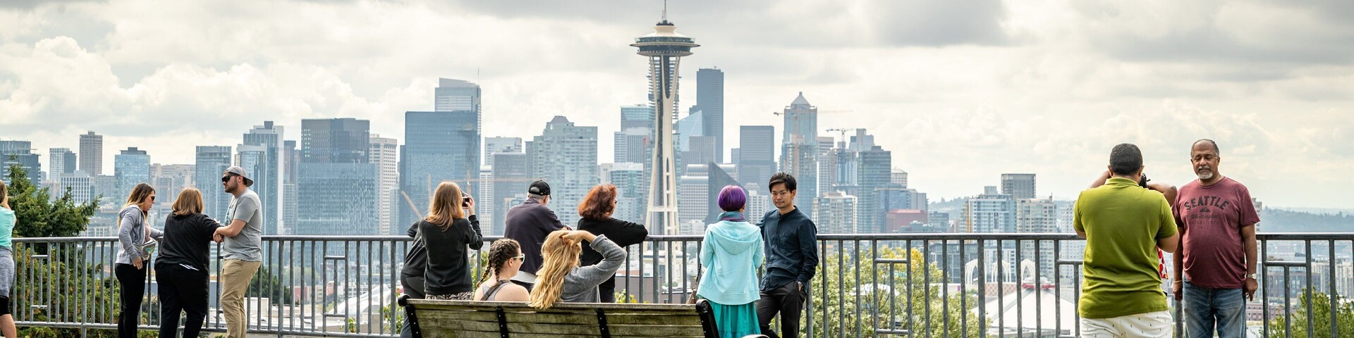 Queen Anne showing views and a garden as well as a small group of people