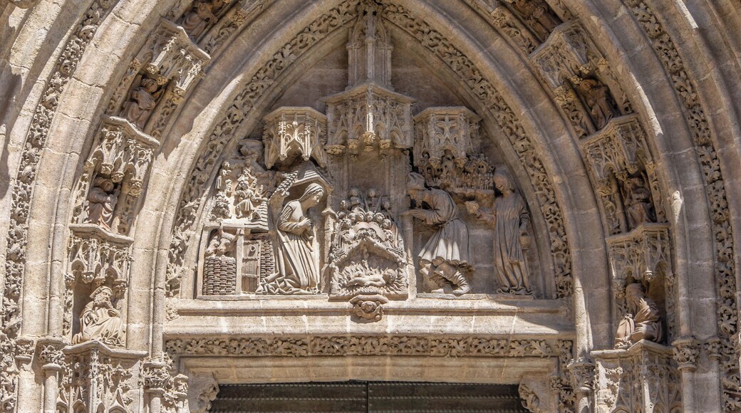 Gothic tympanum of the "Portal de San Miguel", showing the Nativity of Jesus, by Lorenzo Mercadante de Bretaña, between 1464 & 1487. Cathedral of Seville, Spain.