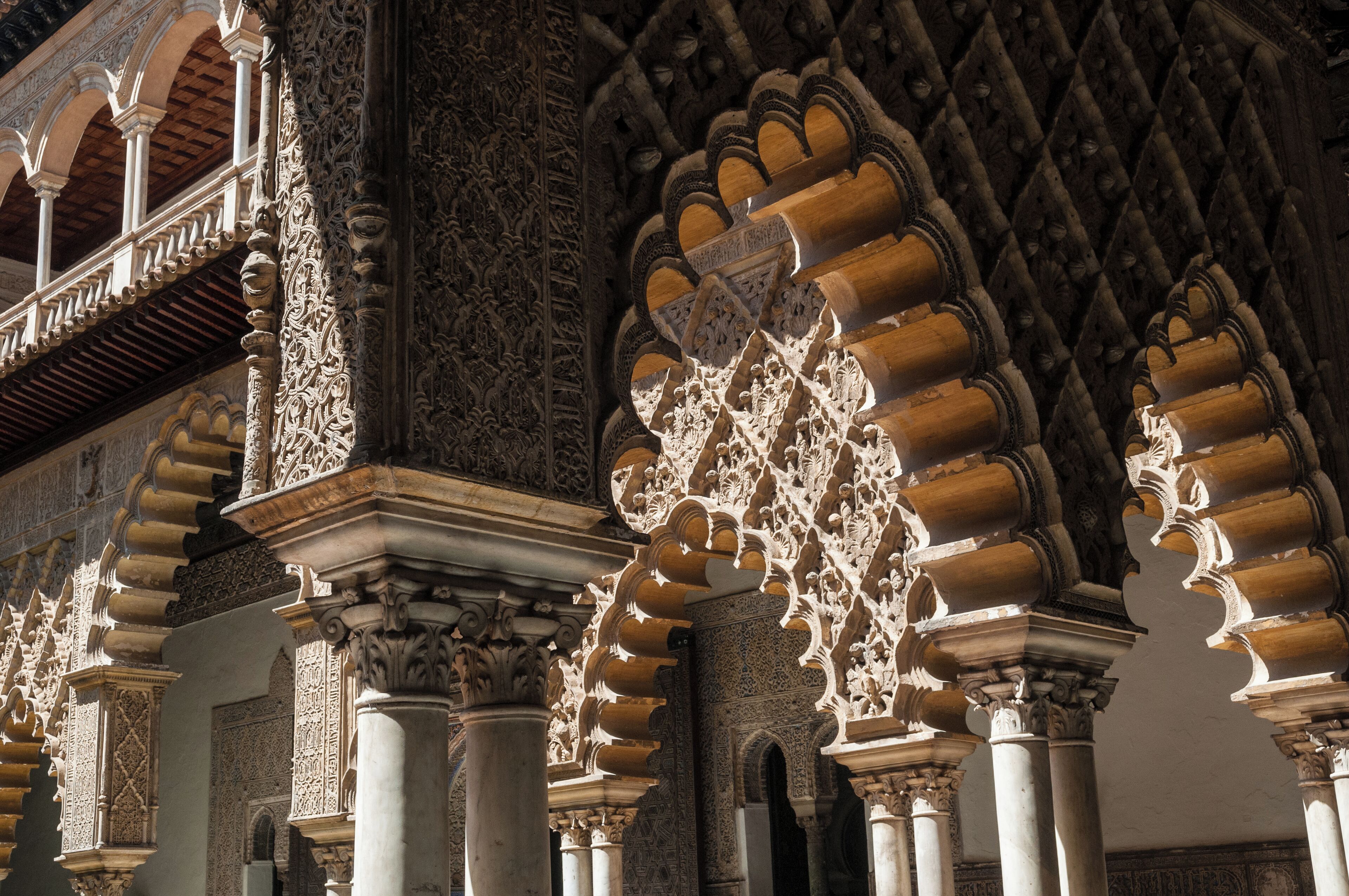 Intricate architectural details of a historic building with ornate arches and columns.