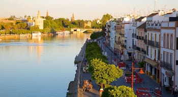 Triana featuring a river or creek, street scenes and a house