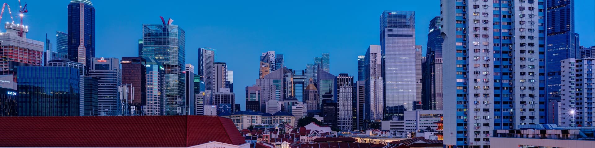 A cityscape with a prominent building labeled 'Lucky Chinatown' and a traditional Chinese lantern display.