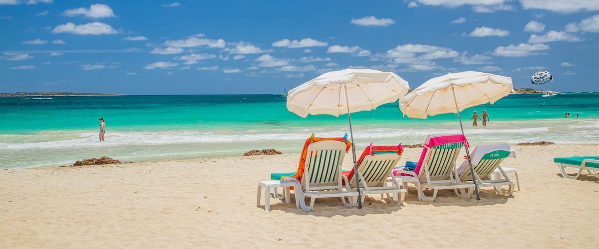 Orient Bay Beach featuring a sandy beach, tropical scenes and general coastal views