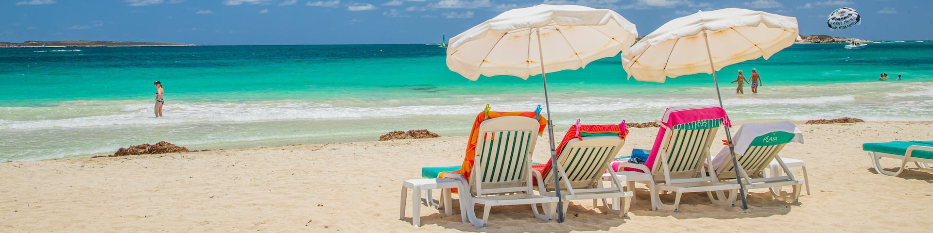 Orient Bay Beach featuring a sandy beach, tropical scenes and general coastal views