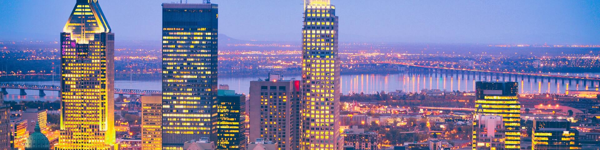 Montreal city skyline at night banner panorama header in Quebec, Canada