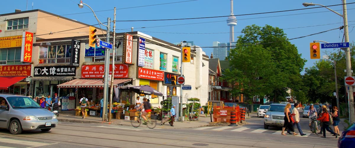 Chinatown featuring signage, a city and street scenes