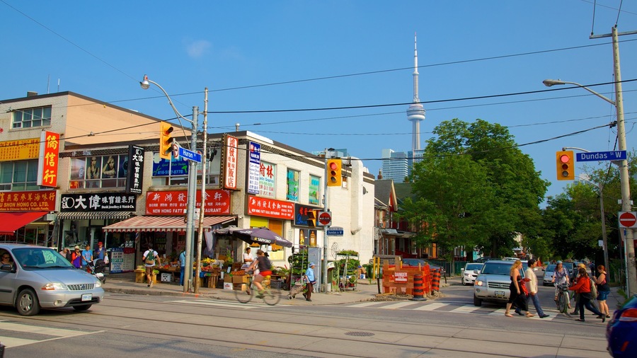 Chinatown featuring signage, a city and street scenes