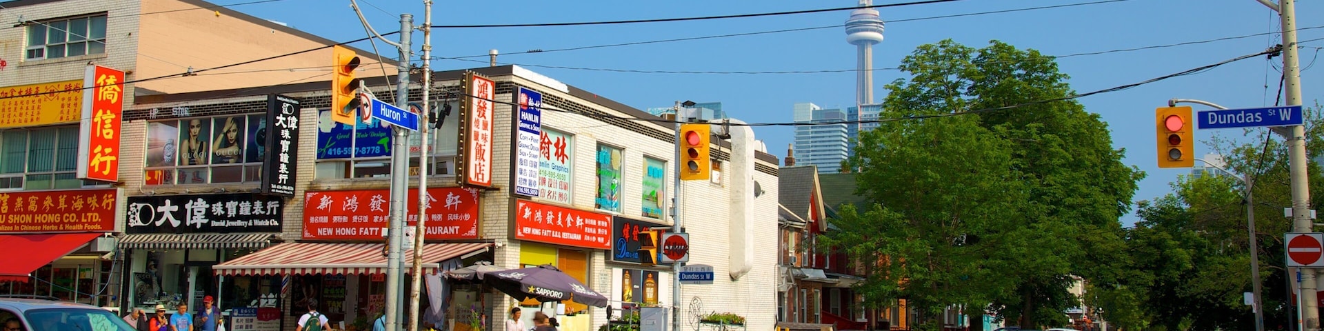Chinatown featuring signage, a city and street scenes