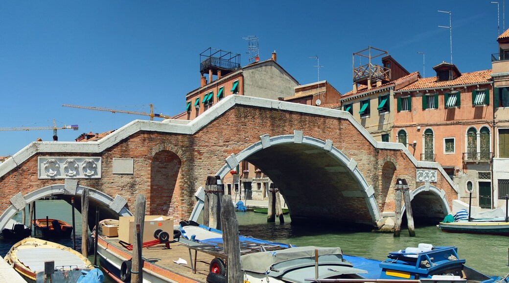 Panoramic summer view Cannaregio canal with Tre Archi Bridge (Ponte dei Tre Archi). Venice. Italy.