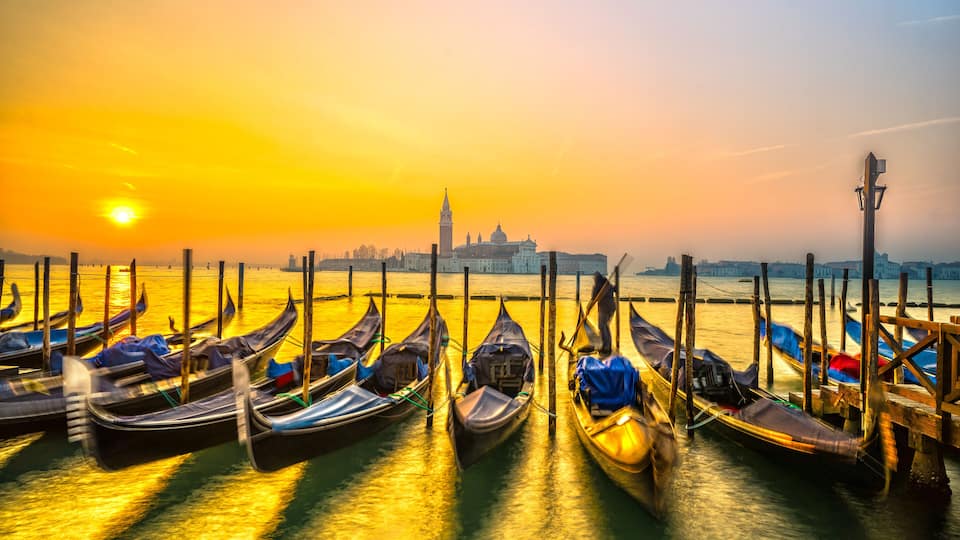 Gondolas in Venice - with San Giorgio Maggiore church. San Marco, Venice, Italy