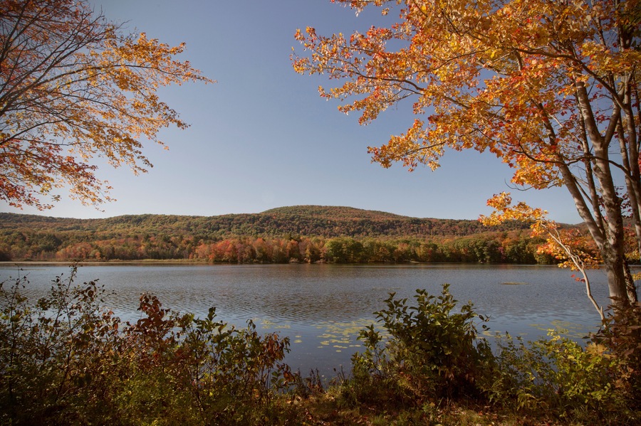An autumn view of Cheshire Lake in the Berkshire Mountains of Western Massachusetts.