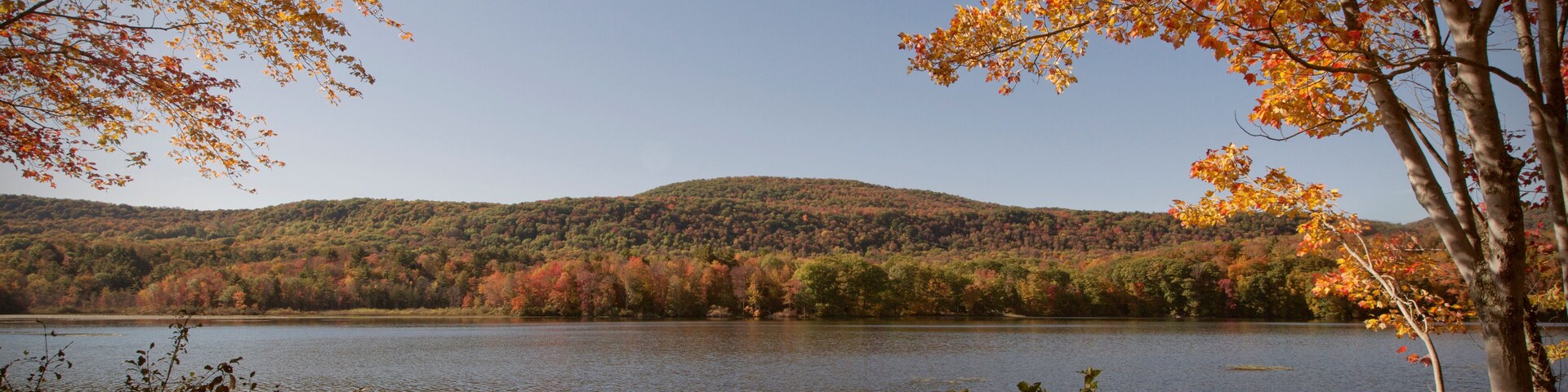 An autumn view of Cheshire Lake in the Berkshire Mountains of Western Massachusetts.