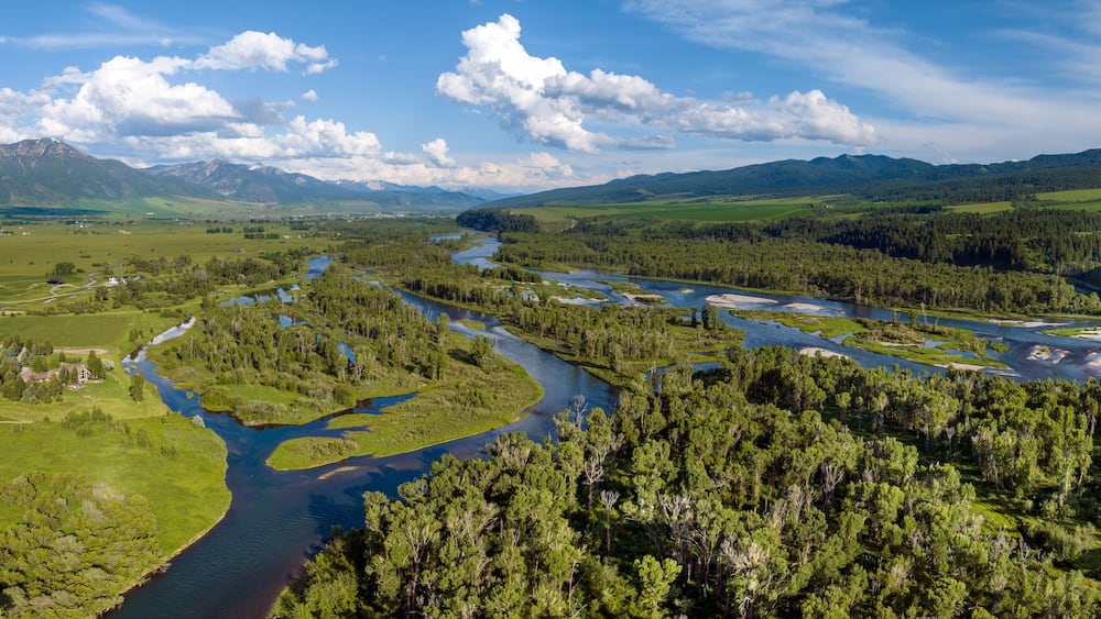 Panoramic view of the Snake River and Fall Creek Falls located in the Swan Valley, Idaho, USA. Summer 2023.