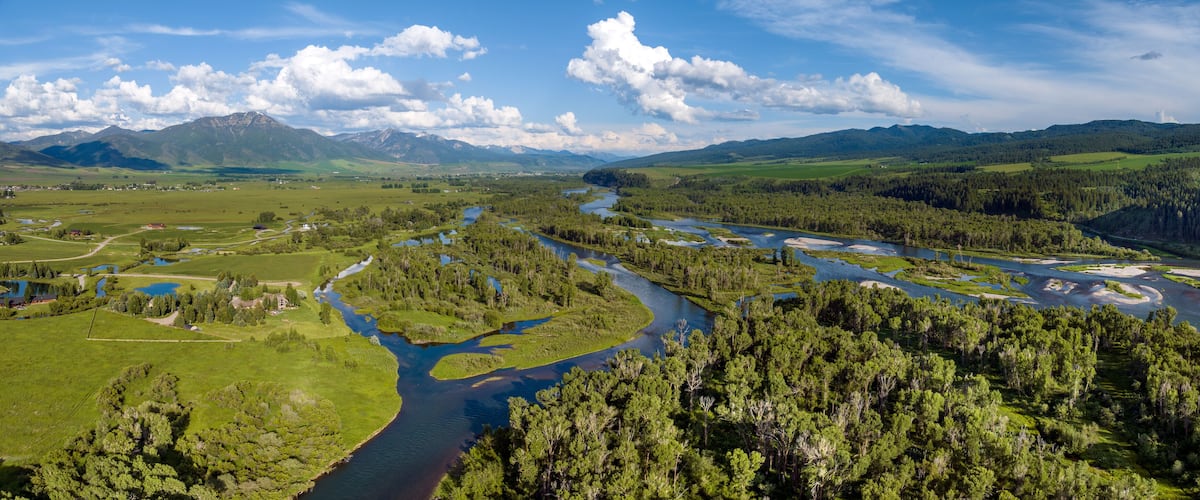 Panoramic view of the Snake River and Fall Creek Falls located in the Swan Valley, Idaho, USA. Summer 2023.