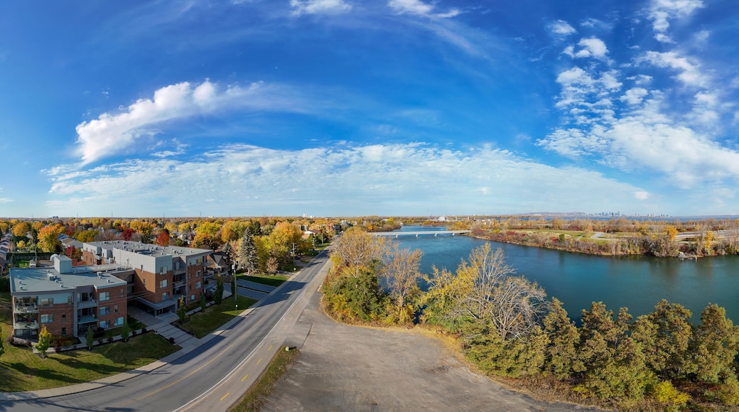 Panoramic view of the south shore of the St. Lawrence River in autumn with Montreal in the background