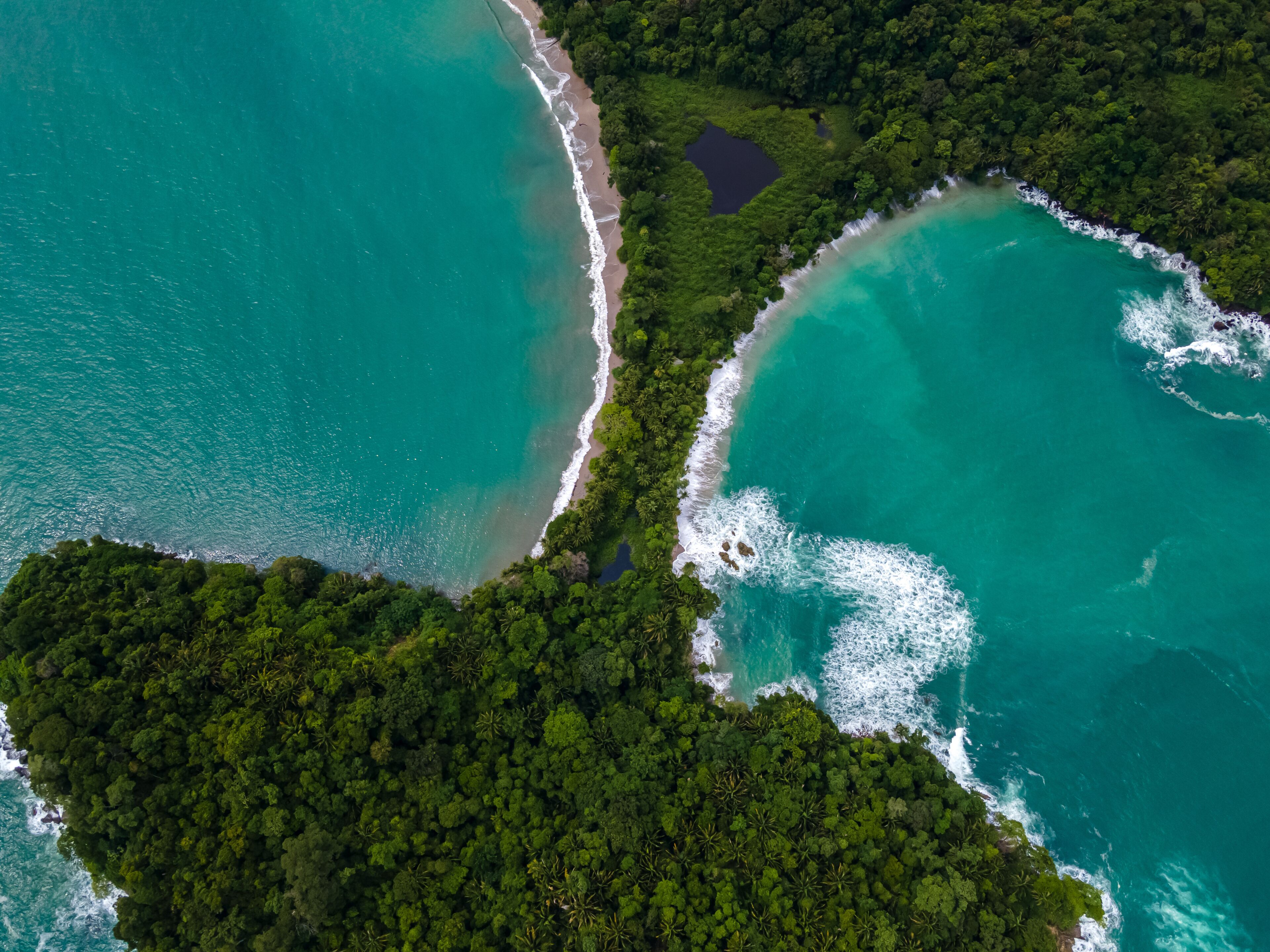 Beautiful aerial view of Manuel Antonio National Park and its magnificent beach in Quepos Costa Rica 