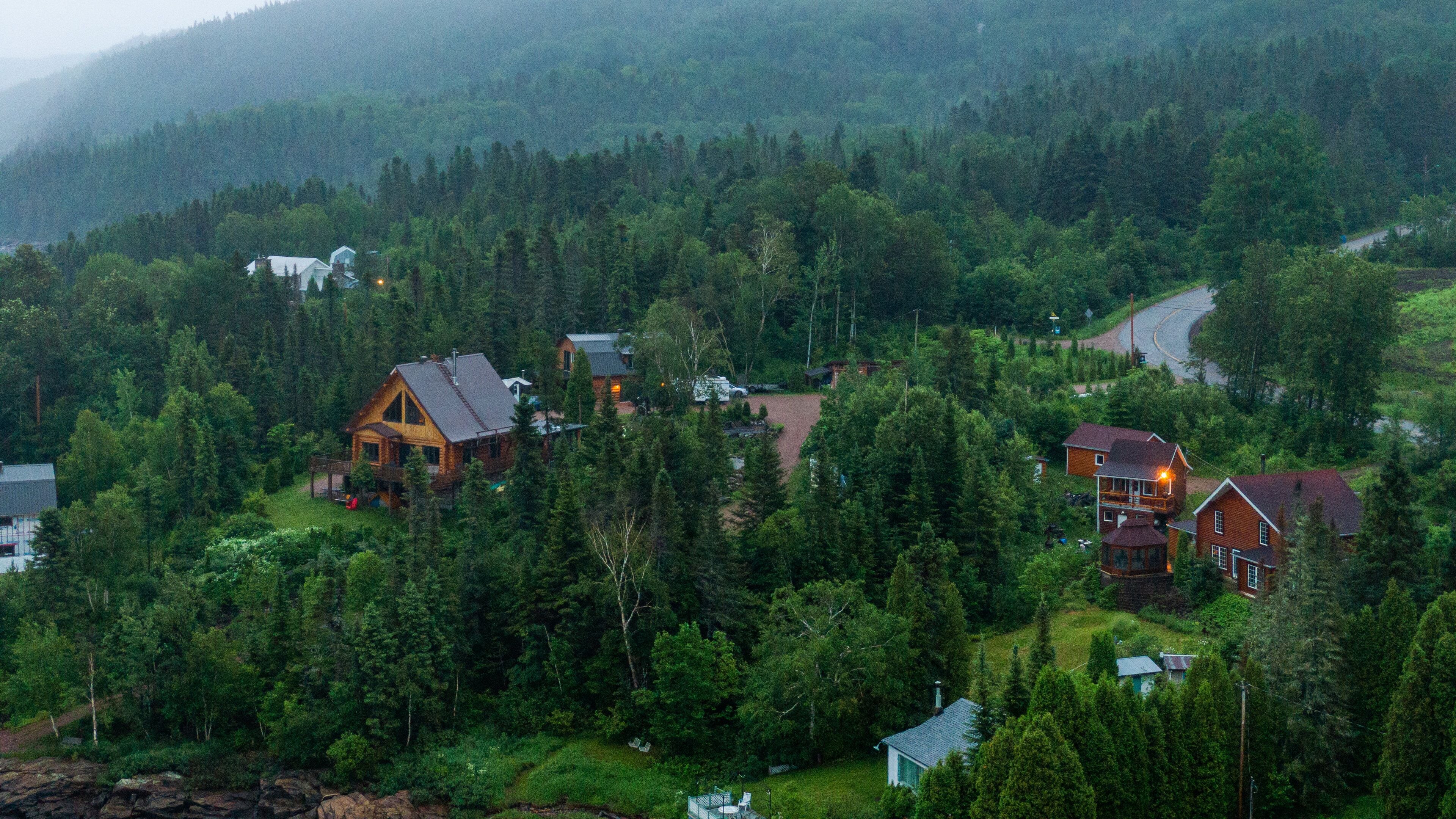 La Baie which includes landscape views, forests and a small town or village