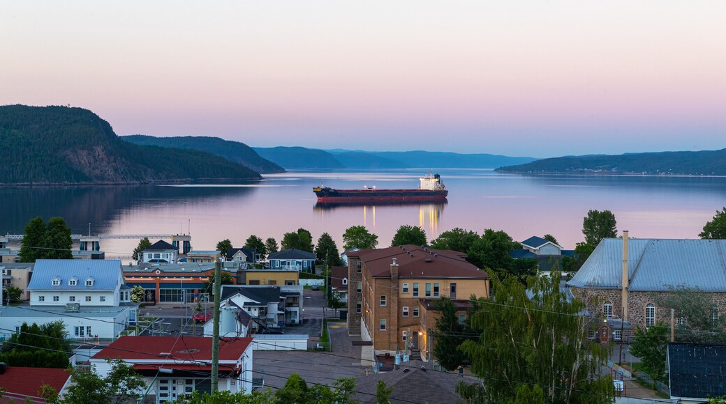 La Baie featuring a sunset, a coastal town and general coastal views