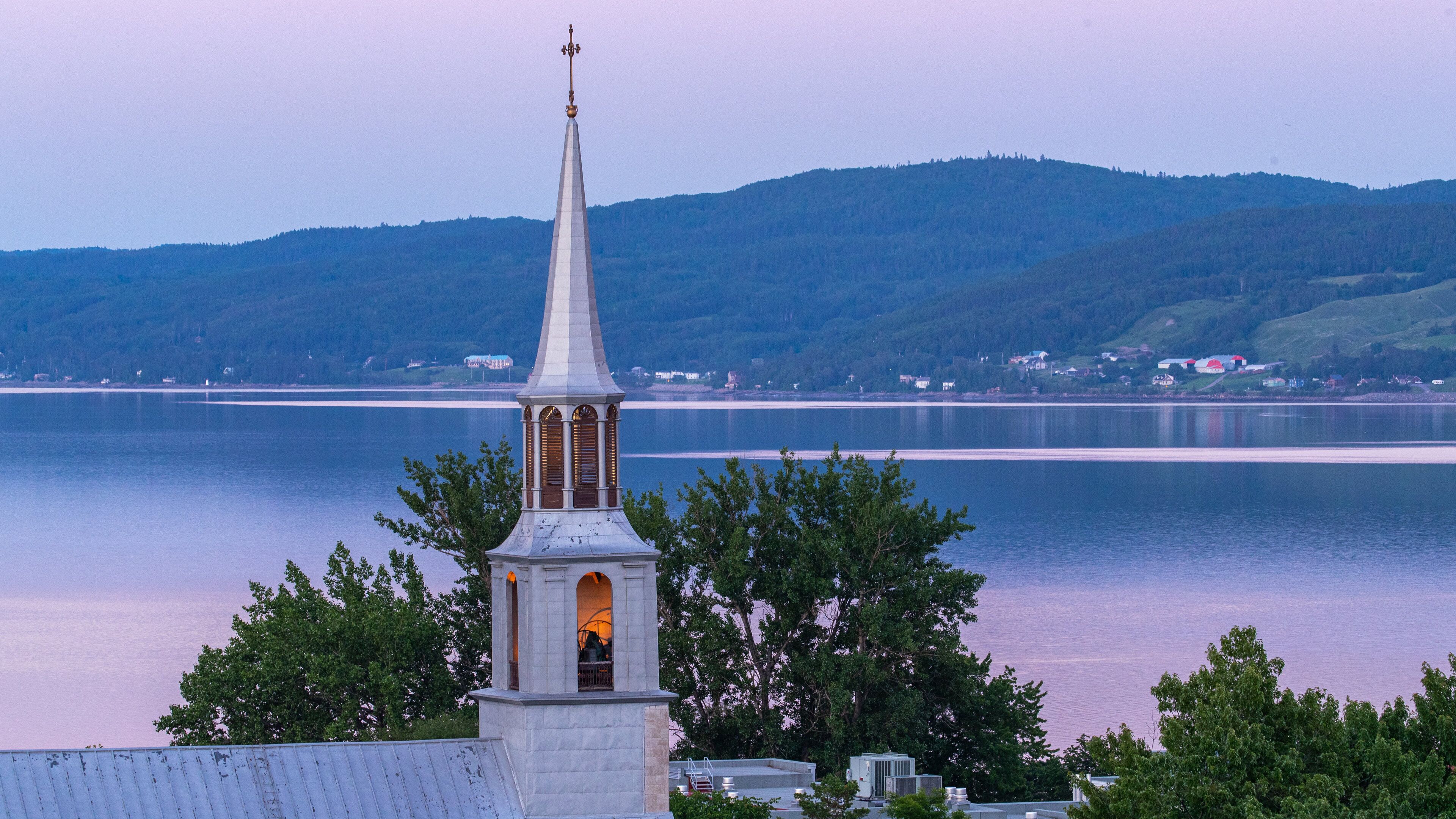 La Baie featuring a church or cathedral, night scenes and a lake or waterhole