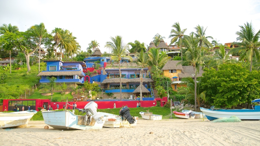 Sayulita featuring boating, a sandy beach and a coastal town