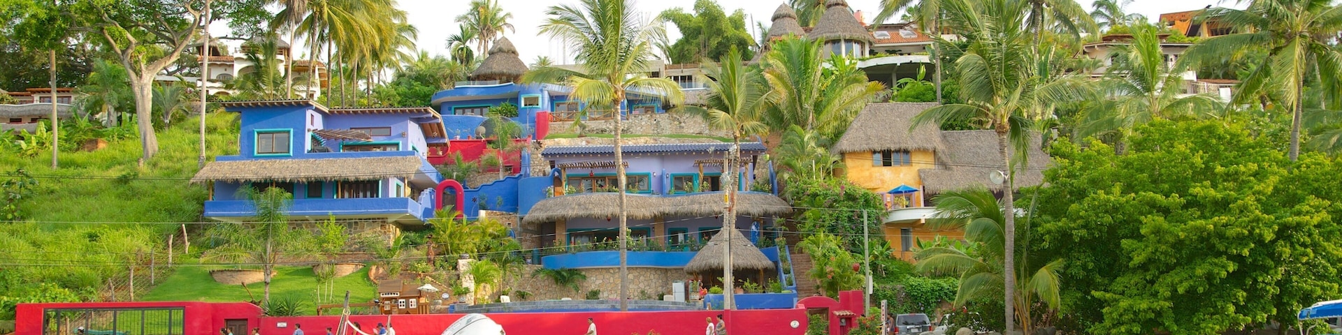 Sayulita featuring boating, a sandy beach and a coastal town