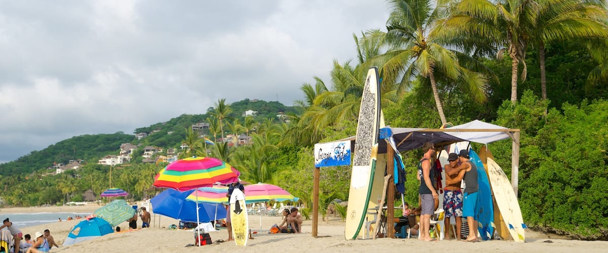 Sayulita featuring surfing, a beach and tropical scenes