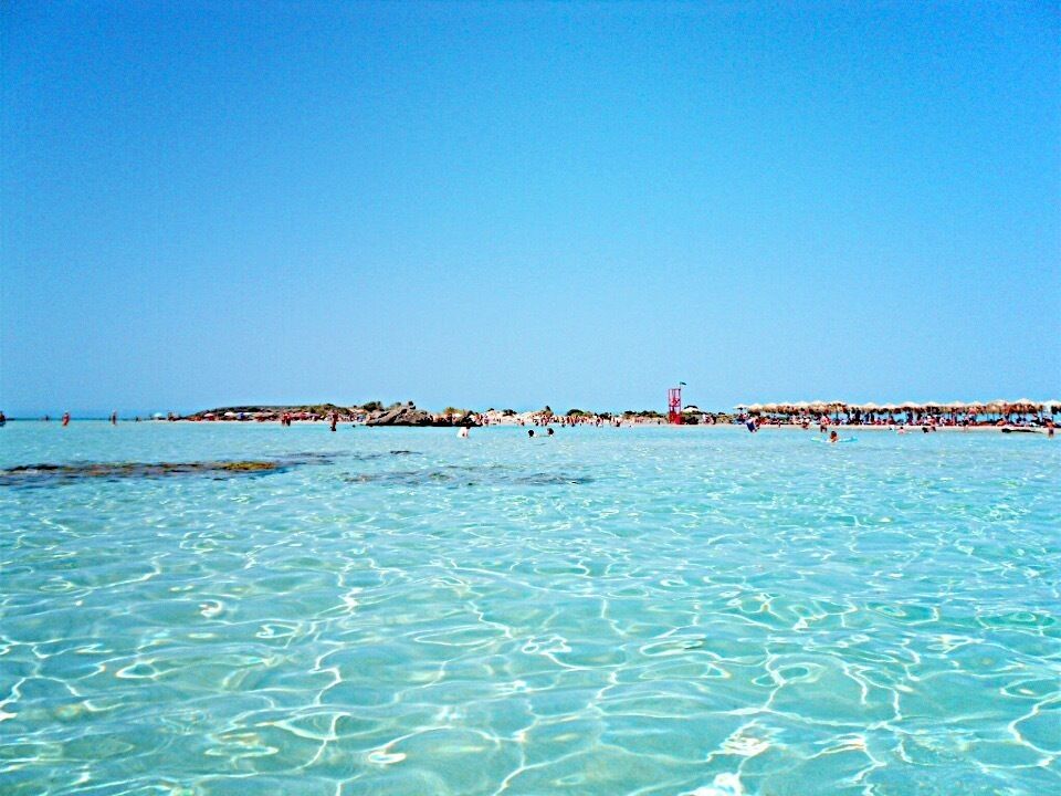 Greece's very own version of the Maldives. Clear turquoise water, and a super long sandy beach. You can walk for hours on end without the water ever getting too deep, and you can even walk all the way over to one of the tiny little isles without you or your things getting wet. It will feel like you're in paradise.

Try to get there early though, the beach will be packed by 11. Also, prepare to get warm, cause the place hardly gets any wind at all so it will feel like you're in a furnace. A good thing you can just lie in the shallow water all day then.

#waterlust