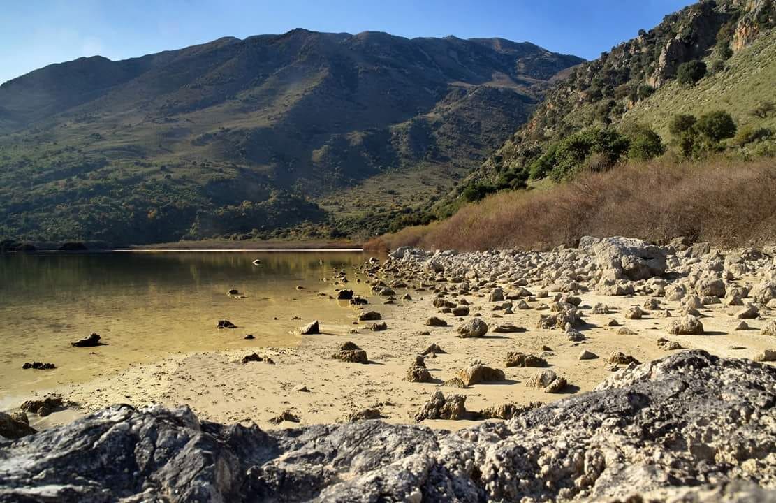 This summer the water level of the only natural fresh water lake on Crete is very low because of the total lack of snow during the winter, and thus lack of melt water