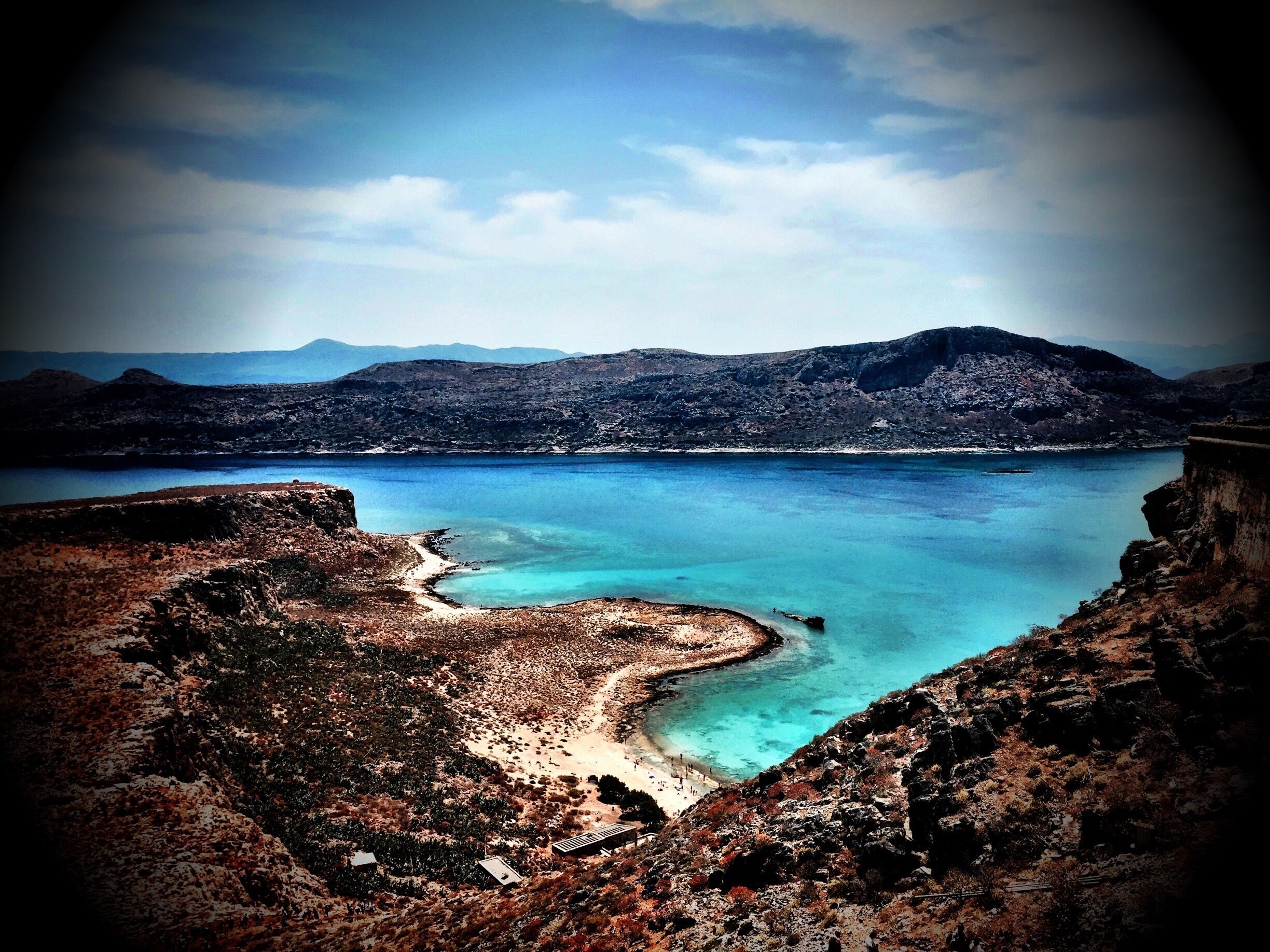 Taken from Imeri Gramvousa. There is a small tavern at the bottom selling drinks and of course raki, which you might need after making the climb to the top. 