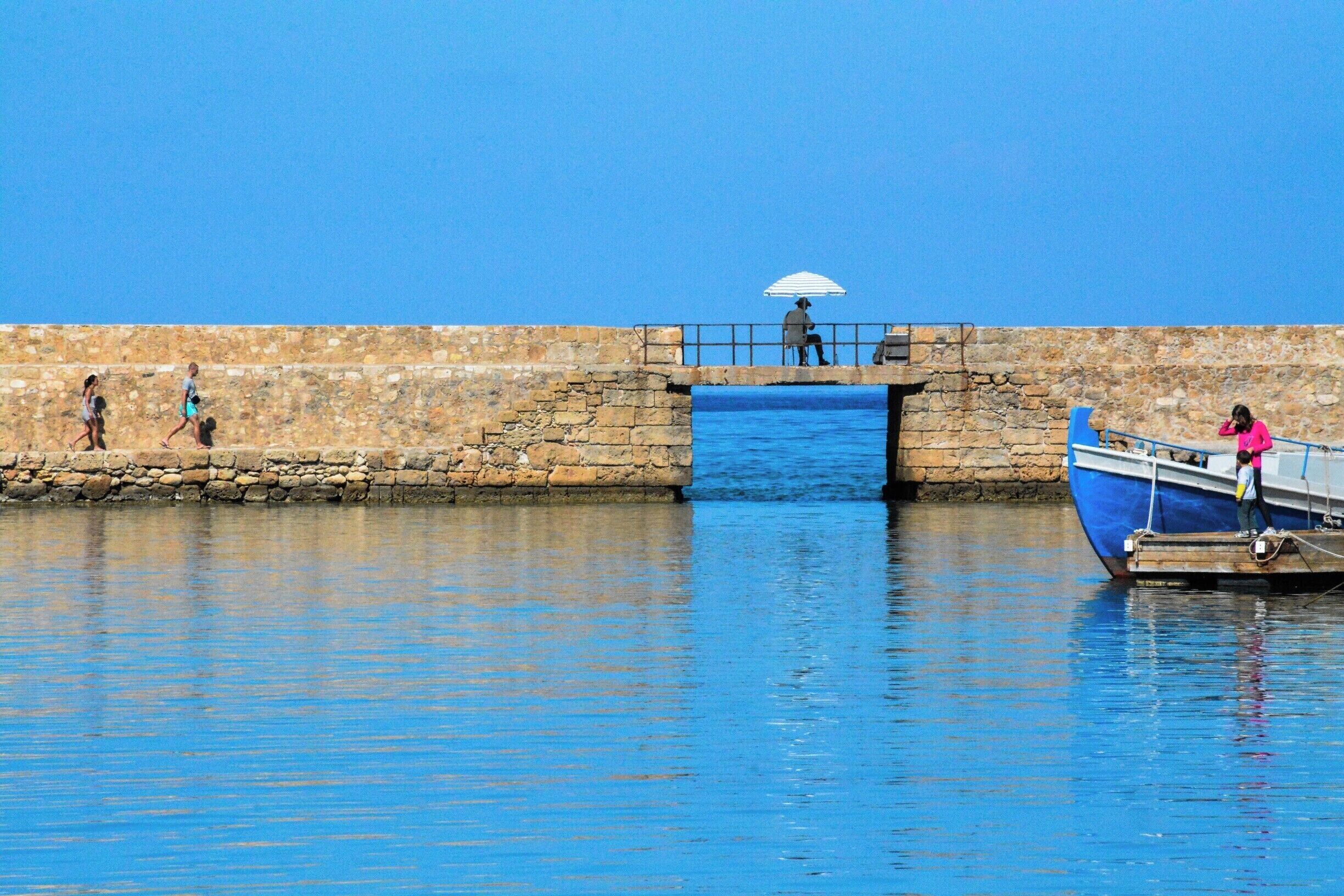 The old port of Chania, or Xania, on Crete, Greece. Chania's old town was built during the town's long Venetian rule, and reminded more of a small Italian city than it did other towns in Greece. http://timeanddestination.com/venetian-cities-greece-chania-rethymno-nafplio/
